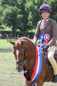 Birkinbrook Arabella TopSpec BSPS Supreme Working Hunter Pony Champion ridden by Matilda Lanni and owned by Milla Lanni